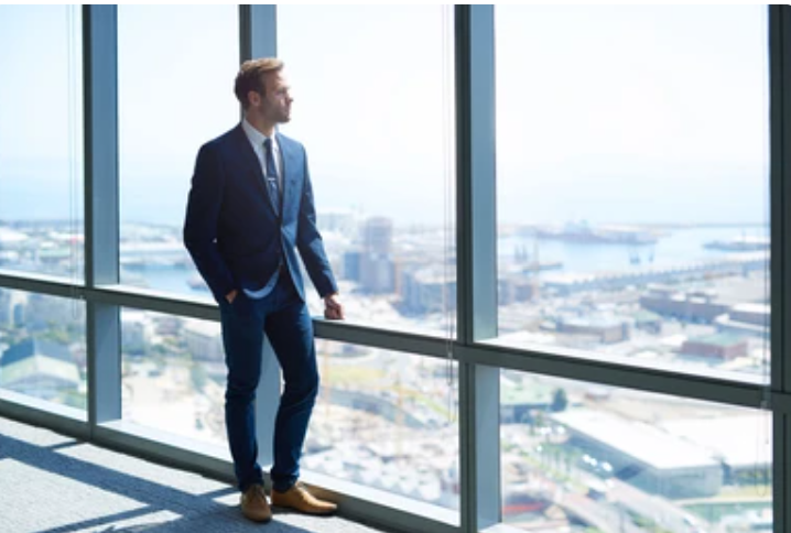 Man wearing a business suit in an office